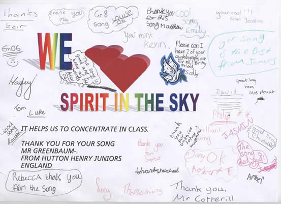 White paper with the words, "We Love Spirit In The Sky. Signed by a primary school class in England.